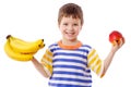 Happy boy holds a bananas and apple Royalty Free Stock Photo