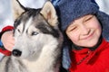 Happy boy with husky dog Royalty Free Stock Photo