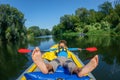 Happy boy kayaking on the river on a sunny day during summer vacation Royalty Free Stock Photo