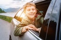 Happy boy look out from auto window Royalty Free Stock Photo