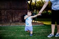 Happy boy making funny faces and expressions while walking with his grandmother Royalty Free Stock Photo