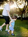 Happy boy making funny faces and expressions while walking with his grandmother Royalty Free Stock Photo