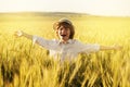 Happy boy in the middle of wheat field Royalty Free Stock Photo