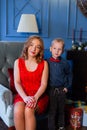 Happy boy with mom in New Year`s decor.