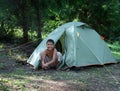 Happy boy near camping tent Royalty Free Stock Photo