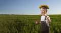 Happy Boy play in bubbles in field sunny summer day Royalty Free Stock Photo