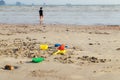 Happy boy playing beach toy and splashing in the sea beach Royalty Free Stock Photo