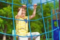 Happy boy playing at playground in summer Royalty Free Stock Photo