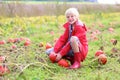 Happy boy playing on pumpkin field Royalty Free Stock Photo