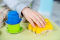 Happy boy plays kinetic sand at home Royalty Free Stock Photo