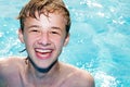 Happy boy in a pool Royalty Free Stock Photo