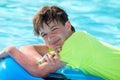 Happy boy in pool Royalty Free Stock Photo