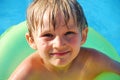 Happy boy in pool Royalty Free Stock Photo