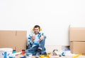 Happy boy in protective headphones sitting Royalty Free Stock Photo