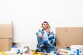 Happy boy in protective headphones sitting Royalty Free Stock Photo