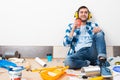 Happy boy in protective headphones sitting Royalty Free Stock Photo