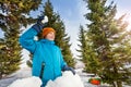 Happy boy ready to throw snowball in forest Royalty Free Stock Photo