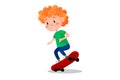 Happy boy riding skateboard outside. Royalty Free Stock Photo