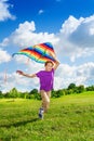 Happy boy running with kite Royalty Free Stock Photo