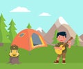 Happy boy scout playing guitar in mount campsite Royalty Free Stock Photo