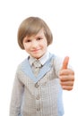 Happy boy is showing thumb up gesture Royalty Free Stock Photo