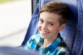 Happy boy sitting in travel bus or train Royalty Free Stock Photo