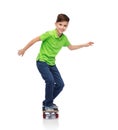 Happy boy with skateboard Royalty Free Stock Photo