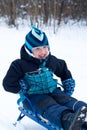 Happy boy sledding Royalty Free Stock Photo