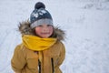 Happy boy in snow play and smile sunny day outdoors Royalty Free Stock Photo