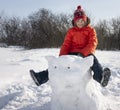 Happy boy in snow play and smile sunny day outdoors Royalty Free Stock Photo