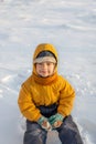 Happy boy in snow play and smile sunny day outdoors Royalty Free Stock Photo