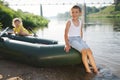 Happy boy swimming in fishing boat Royalty Free Stock Photo