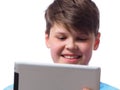Happy boy with a tablet computer Royalty Free Stock Photo
