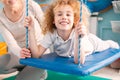 Happy boy on therapy swing Royalty Free Stock Photo