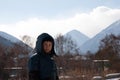 happy boy walking in sunny mountains children's clothing for the mountains close smiling portrait Royalty Free Stock Photo