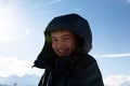 happy boy walking in sunny mountains children's clothing for the mountains close smiling portrait Royalty Free Stock Photo