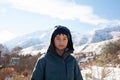 happy boy walking in sunny mountains children's clothing for the mountains close smiling portrait Royalty Free Stock Photo