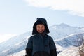 happy boy walking in sunny mountains children& x27;s clothing for the mountains close smiling portrait Royalty Free Stock Photo