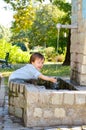 Boy washing hands in a park Royalty Free Stock Photo