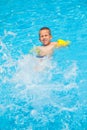 Happy boy with water rings have a fun Royalty Free Stock Photo