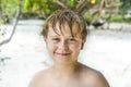 Happy boy with wet hair at the beach Royalty Free Stock Photo