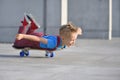 Happy boy, 5 years old, playing with a skateboard Royalty Free Stock Photo