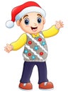 Happy boy in yellow winter clothes waving hand Royalty Free Stock Photo