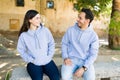 Happy boyfriend and girlfriend on sweatshirts