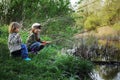 Happy boys fishing Royalty Free Stock Photo