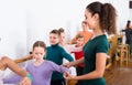 Happy boys and girls rehearsing ballet dance in studio Royalty Free Stock Photo