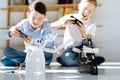 Happy boys playing with their new robot toys Royalty Free Stock Photo