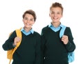 Happy boys in school uniform on background