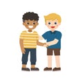 Happy boys standing and shaking hands making peace. Happy multiracial kids best friends.