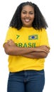 Happy brazilian female soccer fan Royalty Free Stock Photo